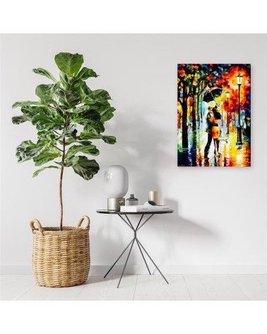 Leinwandbild - Paar unter einem Regenschirm | Feeby