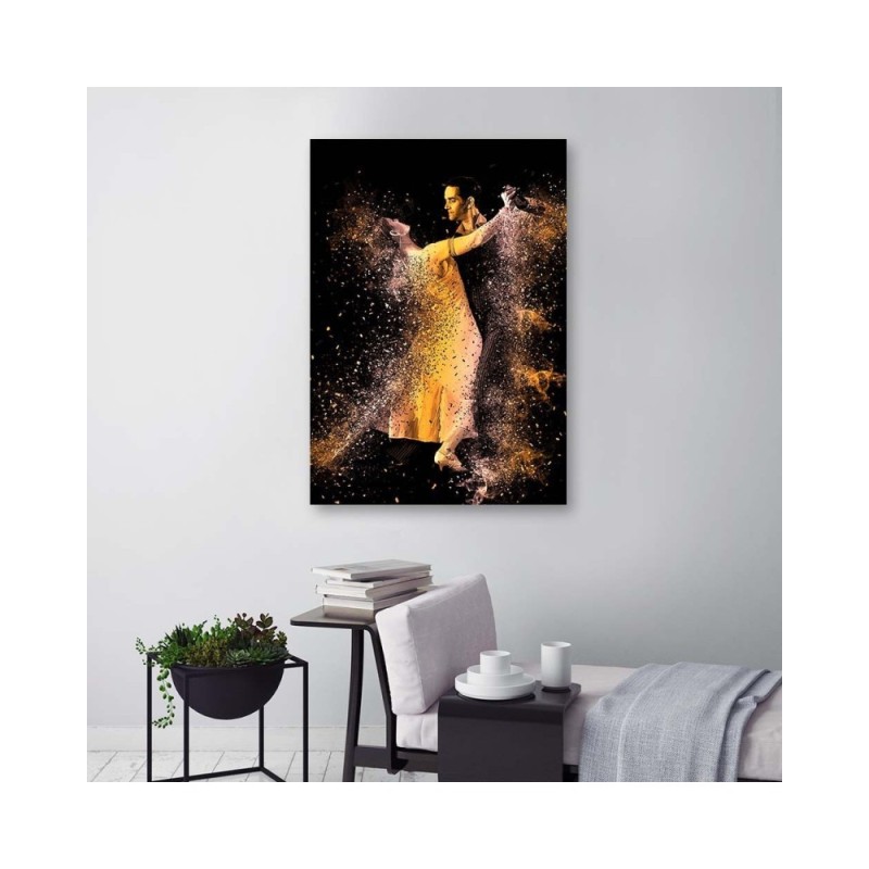 Bild auf Leinwand - Ein Paar tanzt im goldenen Staub | Feeby
