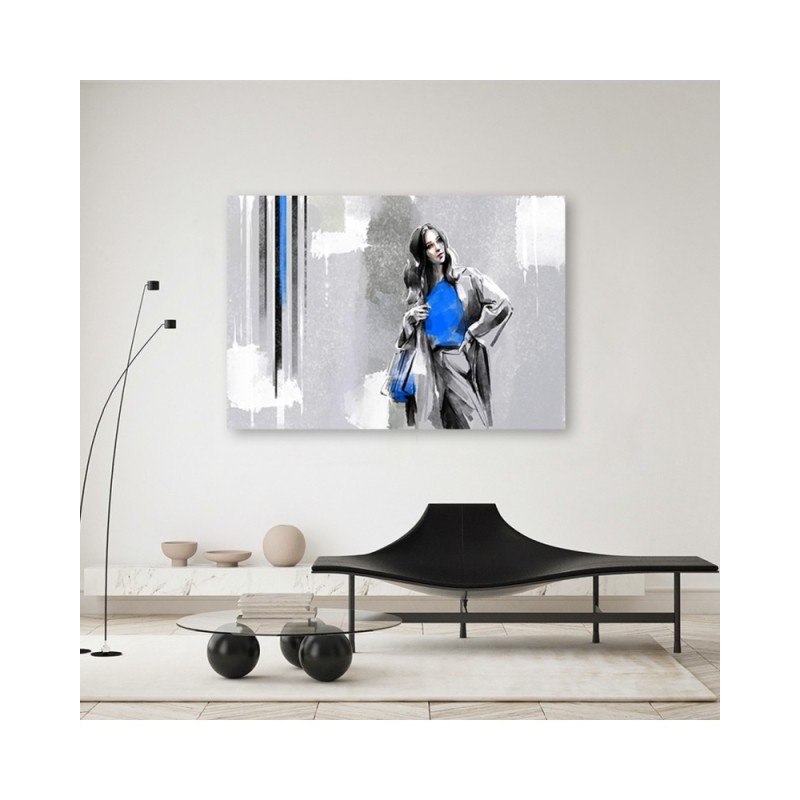 Leinwandbild - Eine Frau in einem Mantel | Feeby