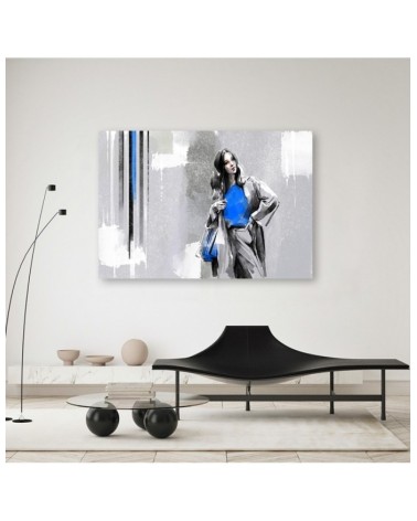 Leinwandbild - Eine Frau in einem Mantel | Feeby