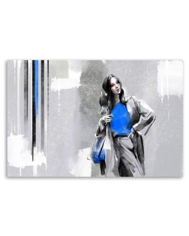 Leinwandbild - Eine Frau in einem Mantel | Feeby