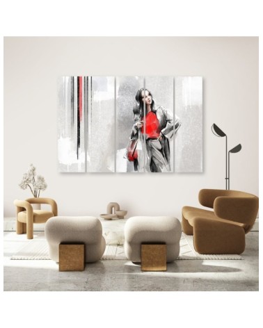 Leinwandbild - Eine Frau in einem Mantel | Feeby