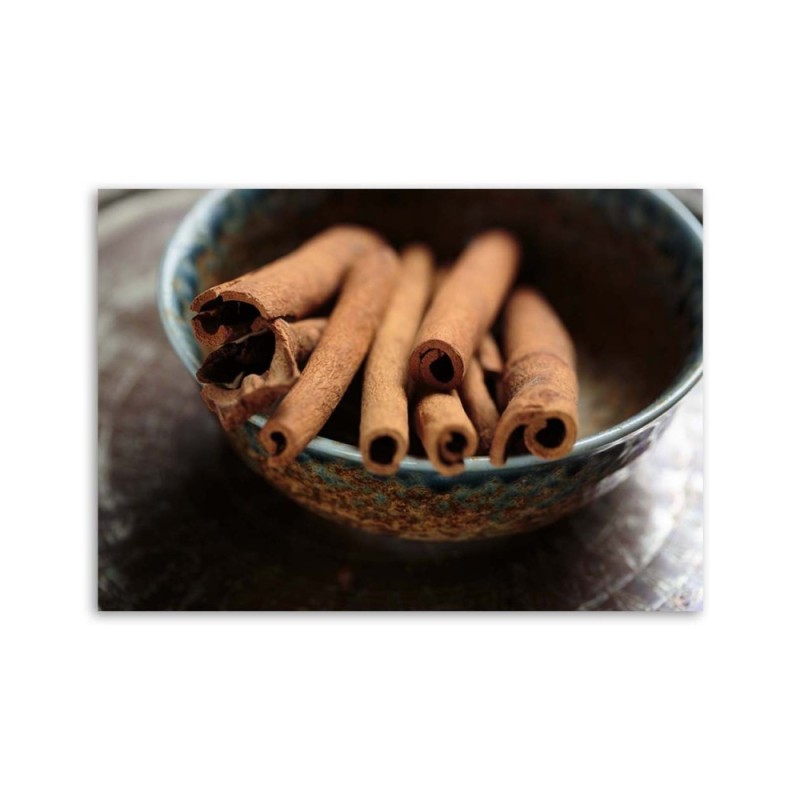 Bild auf Leinwand - Zimtstangen in einer Schale | Feeby