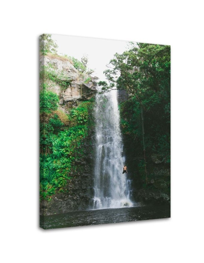Leinwandbild - Mann springt von einem Wasserfall | Feeby