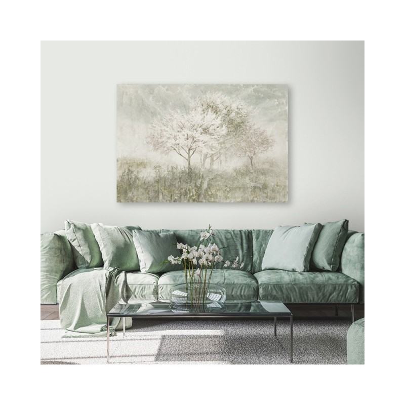 Bild auf Leinwand - Ein blühender Baum in der Wiese | Feeby