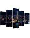 Canvas print for living room - Illuminated skyscraper | FEEBY