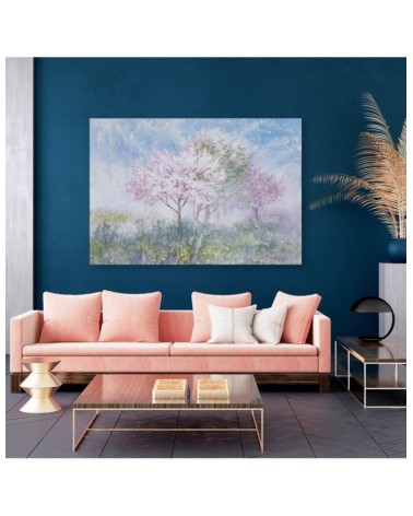 Leinwandbild modern - Ein blühender Baum in der Wiese | Feeby