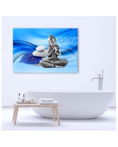 Leinwandbild - Figur des Buddha auf blauem Hintergrund | Feeby