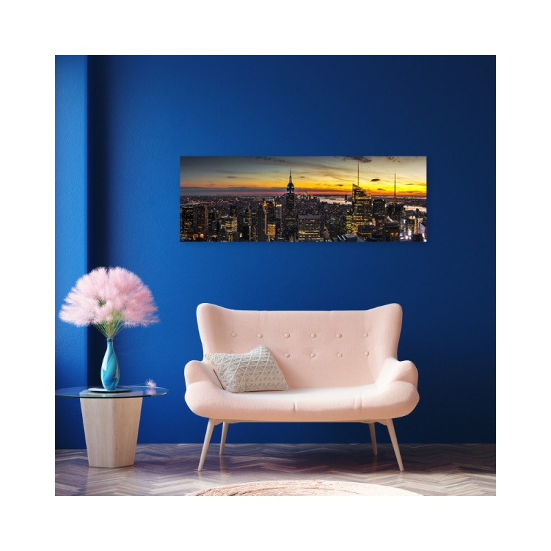 Bild - Stadt vor dem Hintergrund der untergehenden Sonne | Feeby