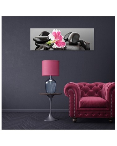 Leinwandbild - Blume und dunkle Zen-Steine | Feeby