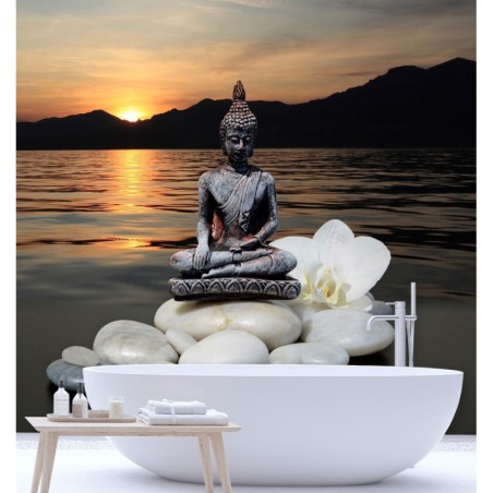 Fototapete - Buddha-Figur auf den Steinen bei Sonnenuntergang | Feeby